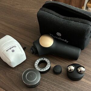 Therabody Black and Gold Massage Device Set